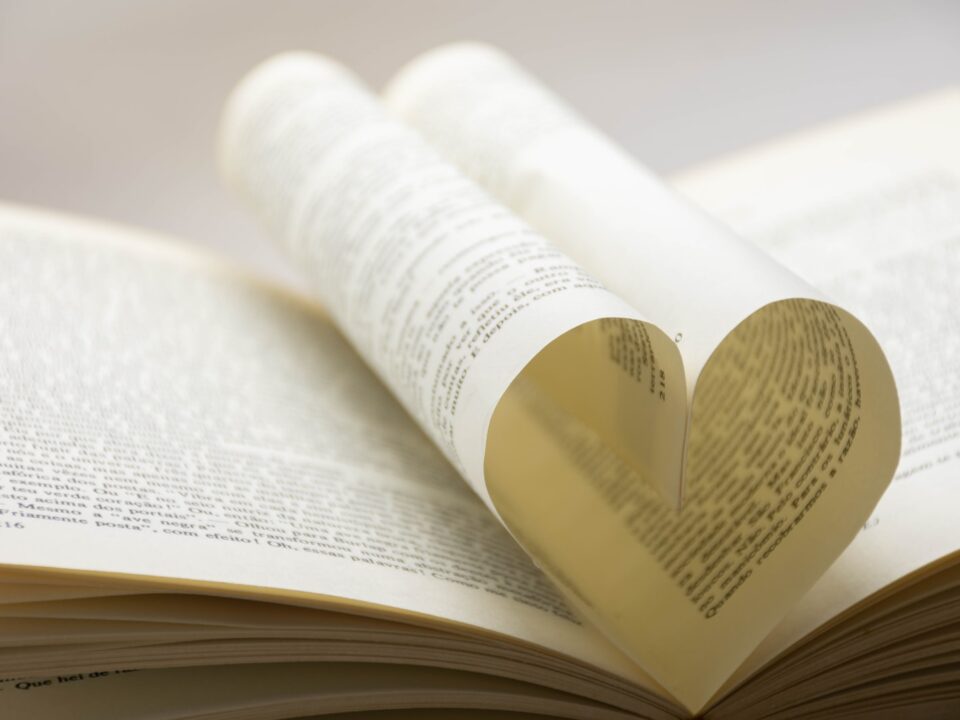 white book page with yellow and white plastic bottle