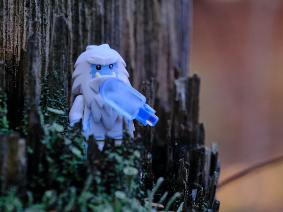 white angel figurine on tree branch
