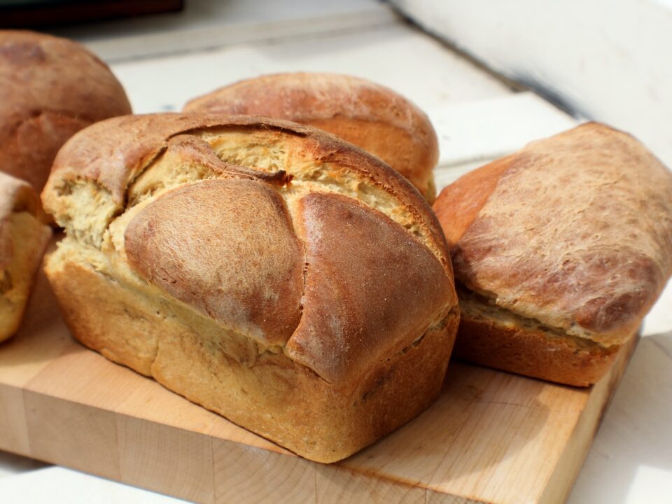 bread on brown wooden tray
