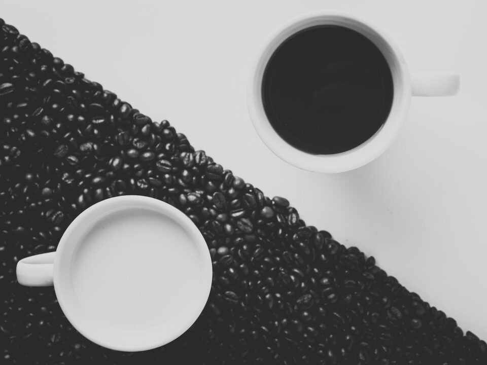 white ceramic coffee mug filled with black liquid