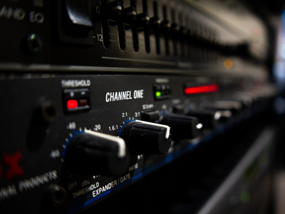 black audio mixer turned on in close up photography