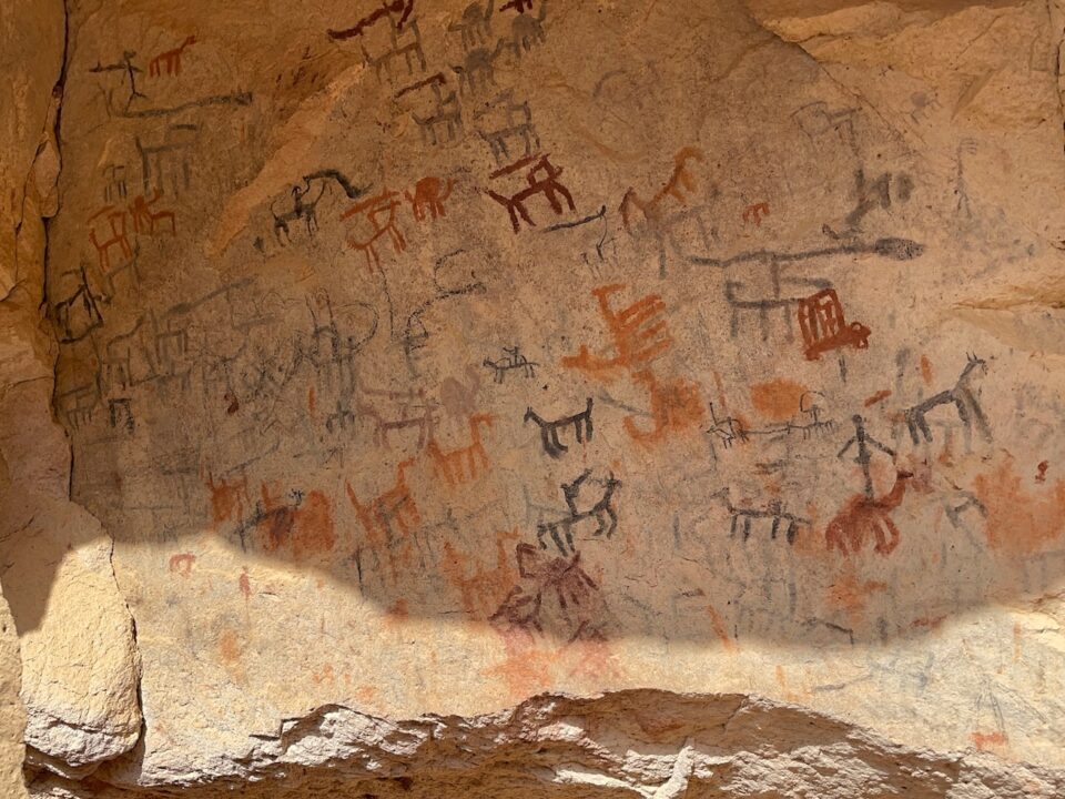 a large rock with some writing on it