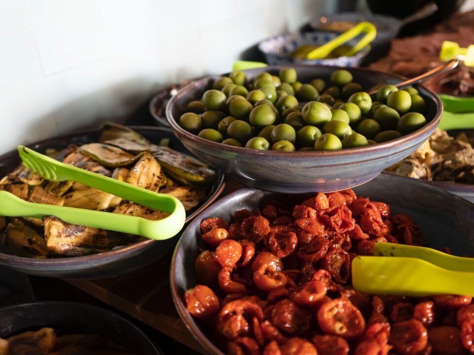 a group of bowls with food in it