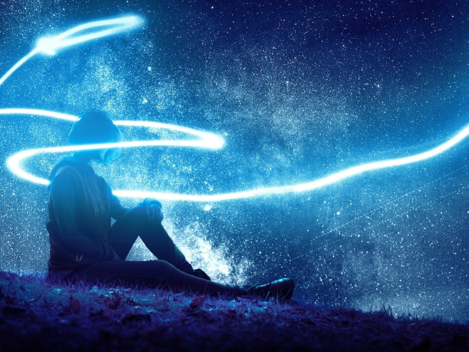 person seated on grass