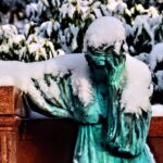 green statue of a man