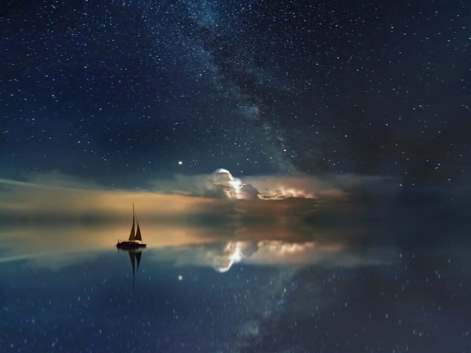 black sailing boat digital wallpaper