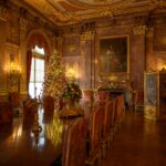 a large room with a christmas tree