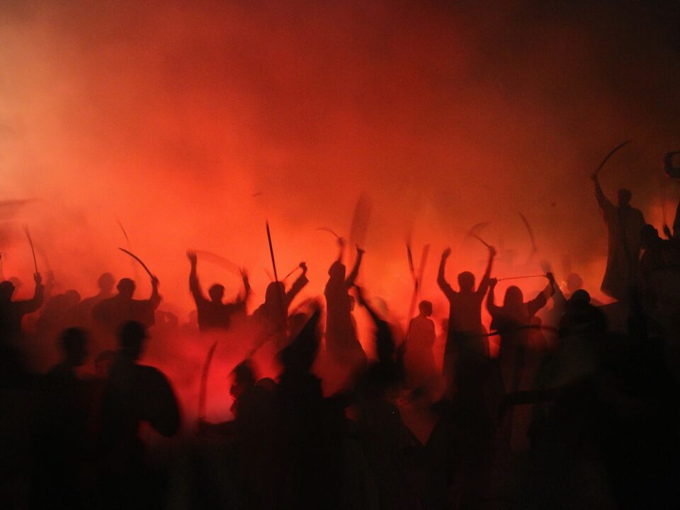 people gathering on street during nighttime