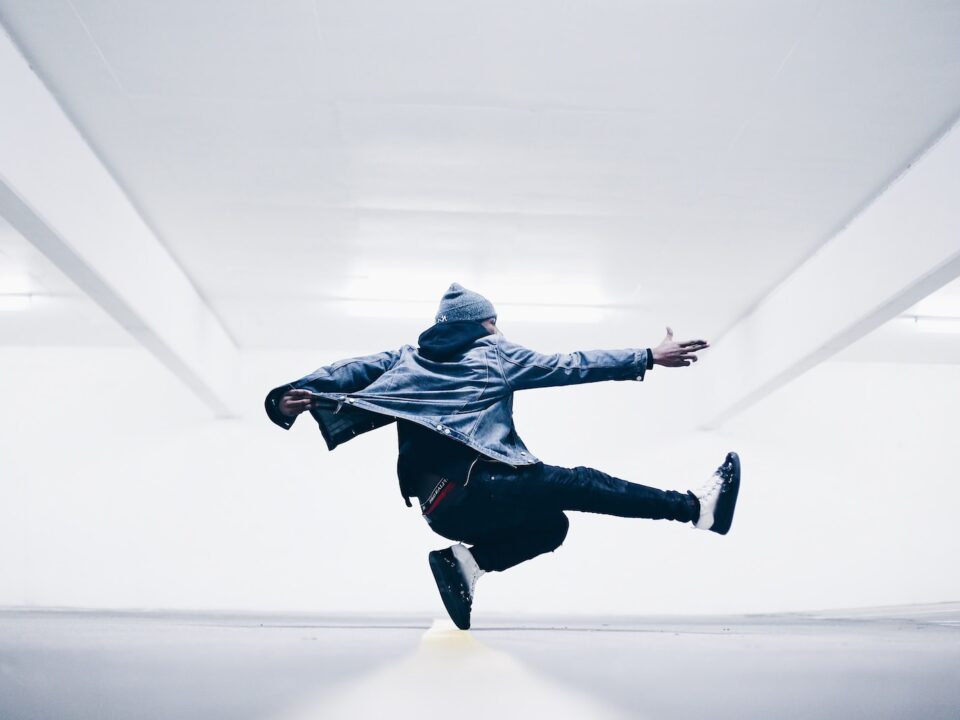 man jumping in the middle taken at daytime