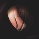 basketball near brown table