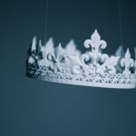 shallow focus photography white crown hanging decor