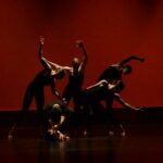 group of people performing on stage