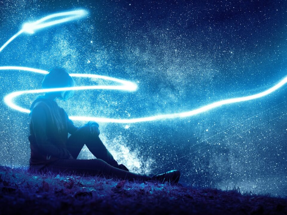 person seated on grass