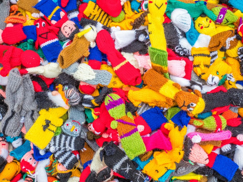 a pile of colorful stuffed animals