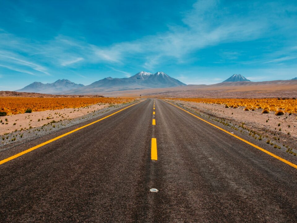 lone road going to mountains
