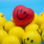 red and yellow smiley balloon