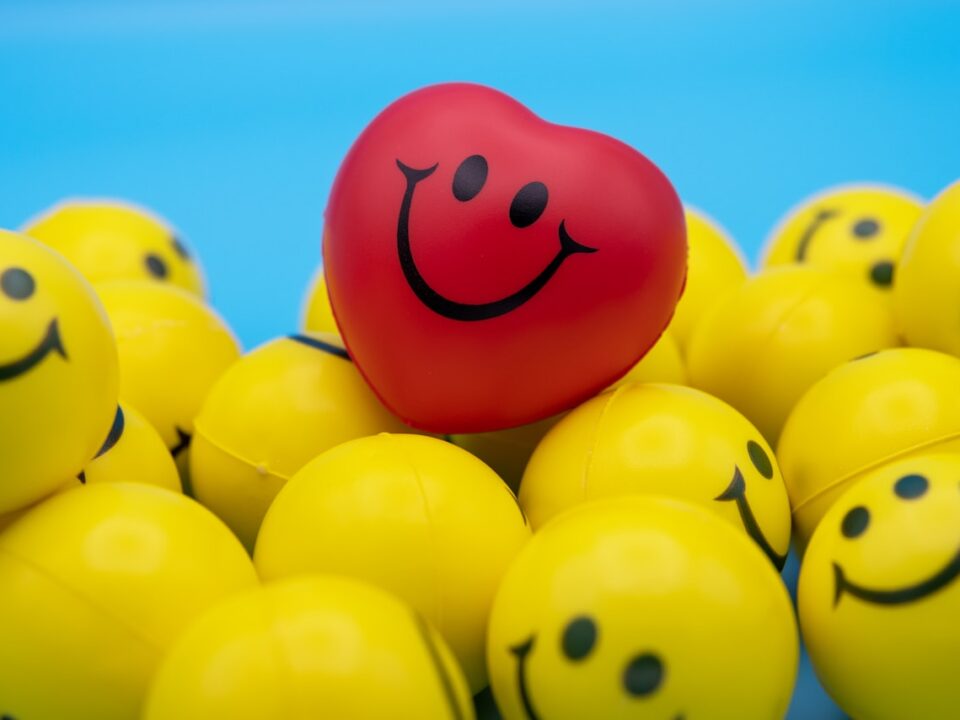 red and yellow smiley balloon
