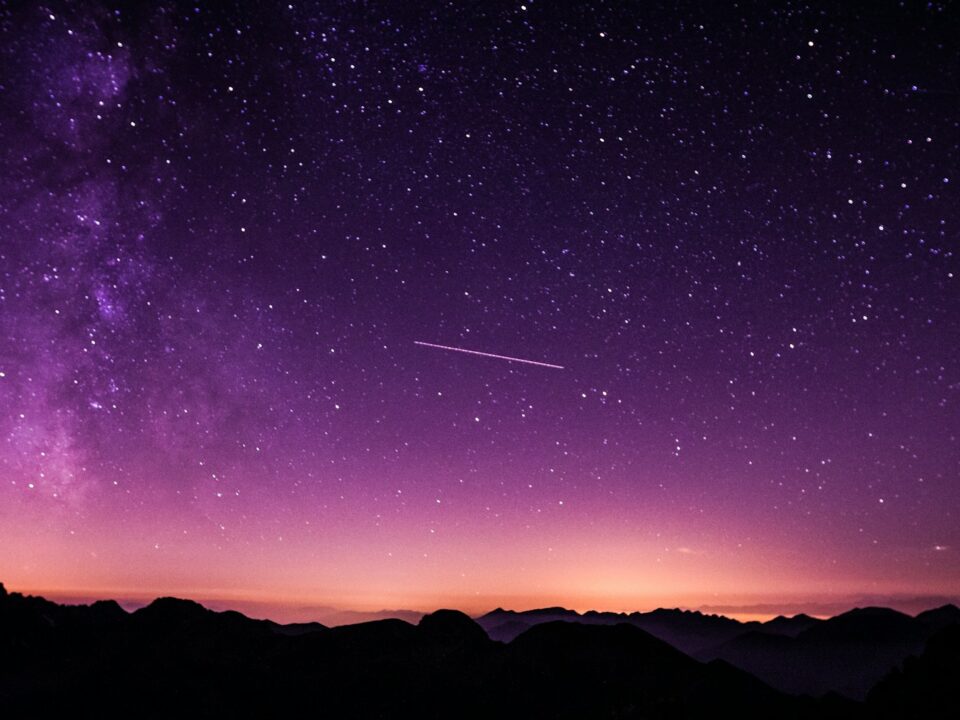 silhouette photo of mountain during night time