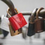 a red padlock with a heart on it