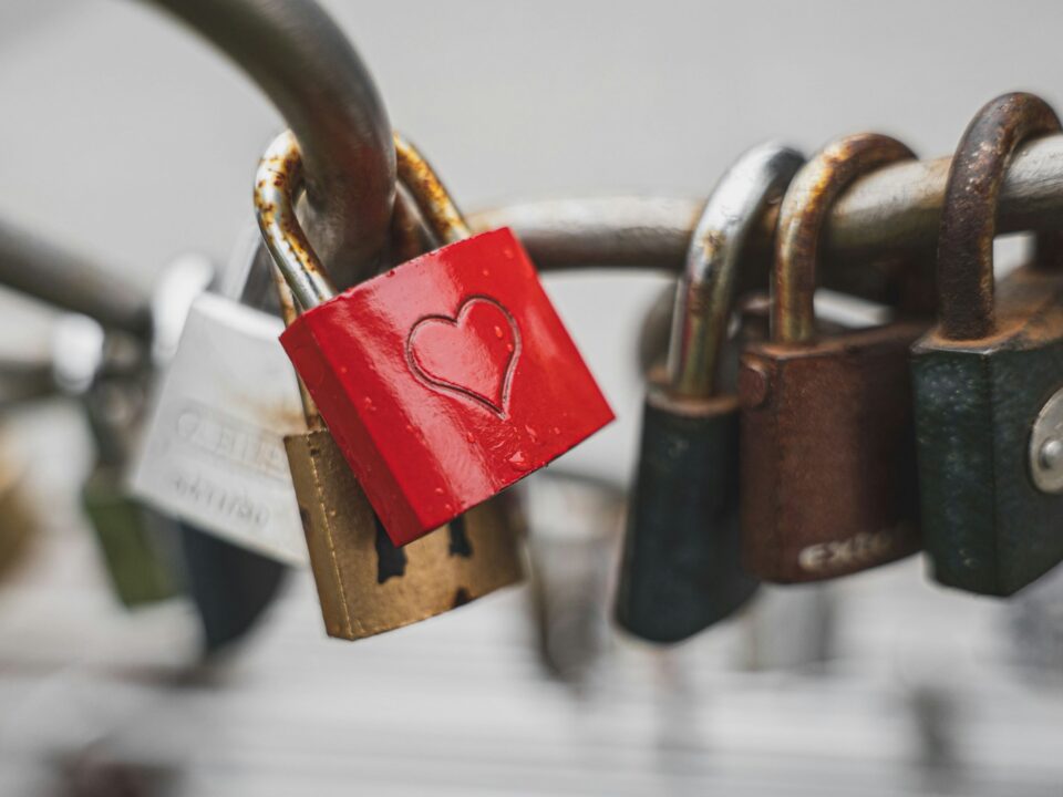 a red padlock with a heart on it