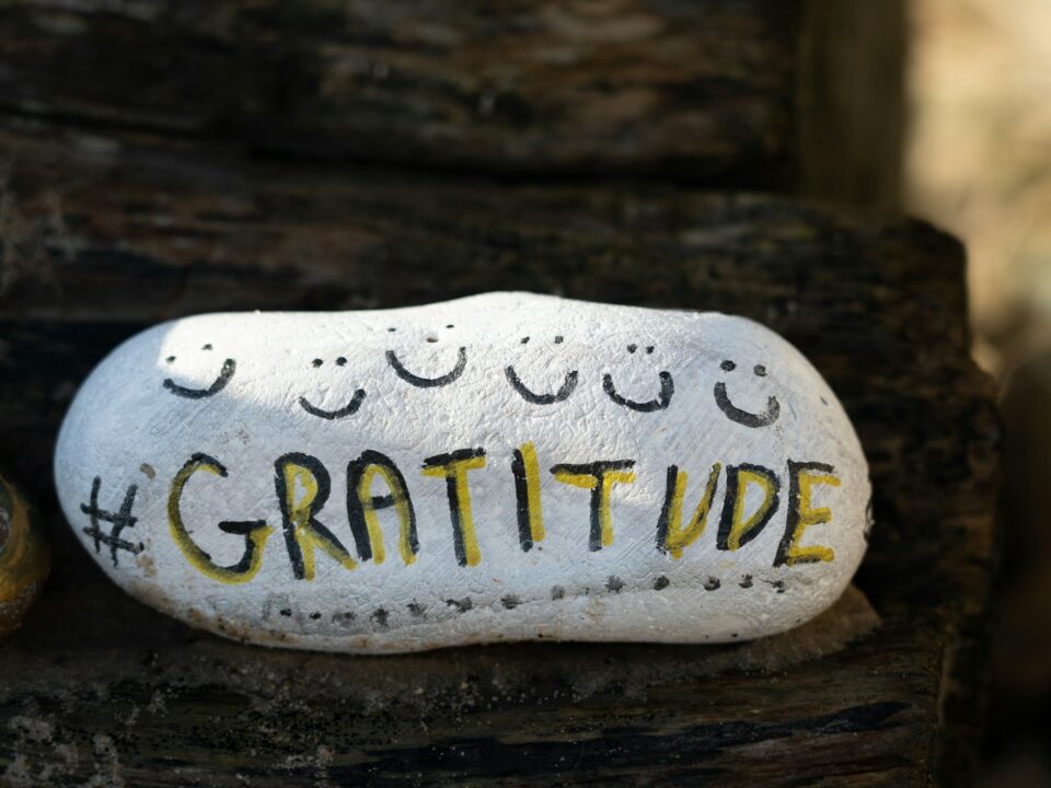 a white and yellow object with writing on it