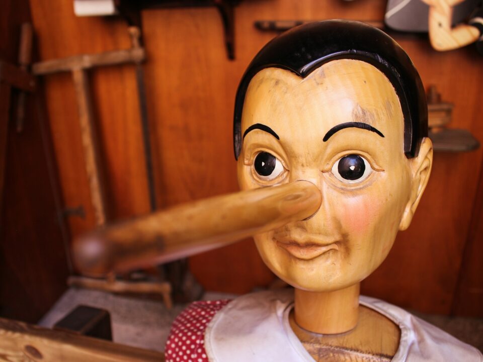 selective focus photography of Pinocchio puppet