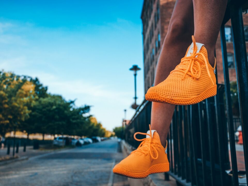 person wearing orange shoes
