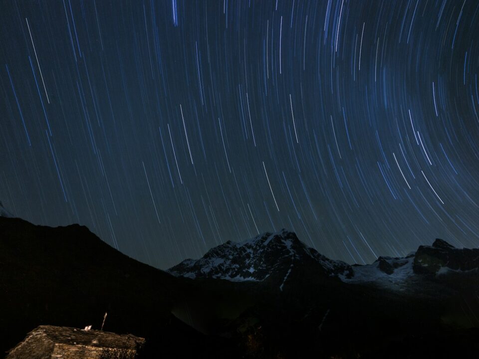 mountains under starry night