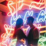 selective focus photography of man and woman about to kiss