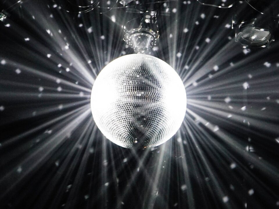 grayscale photography of disco ball