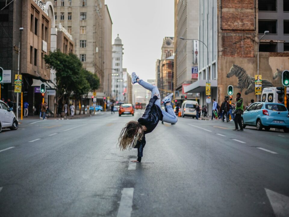 person hand standing on concrete road