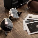 shallow focus photo of black sunglasses with silver frames