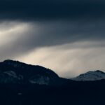 landscape photography of mountain under cloudy sky during daytime