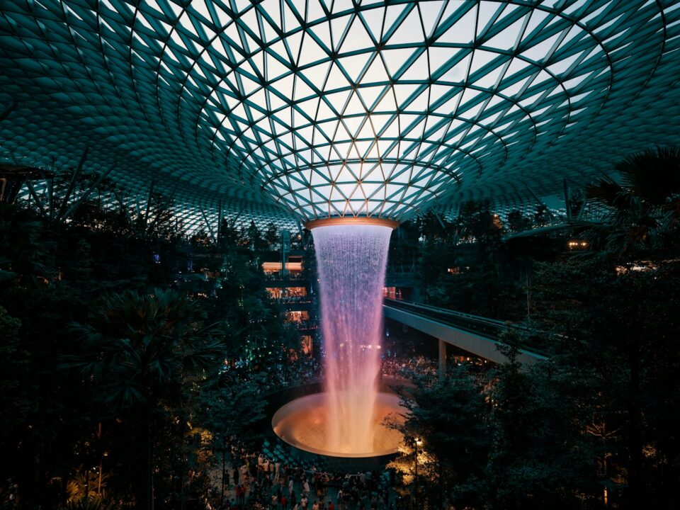 a large fountain in the middle of a building