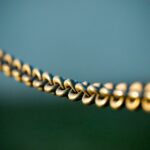 tilt shift photography of gray steel chains