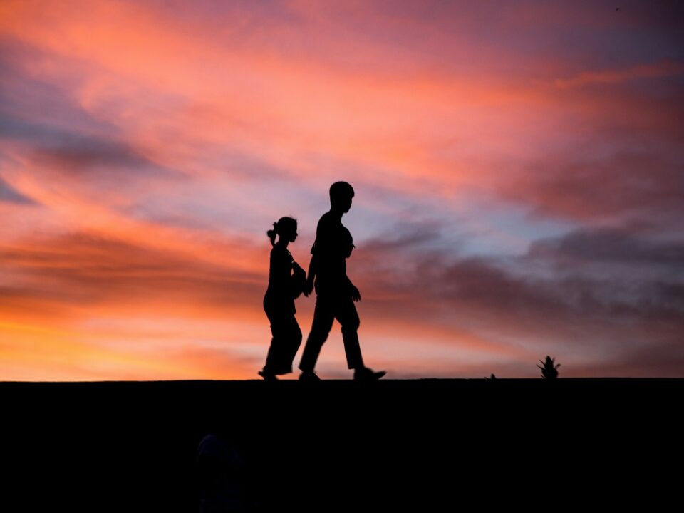 silhouette photography of man and woman