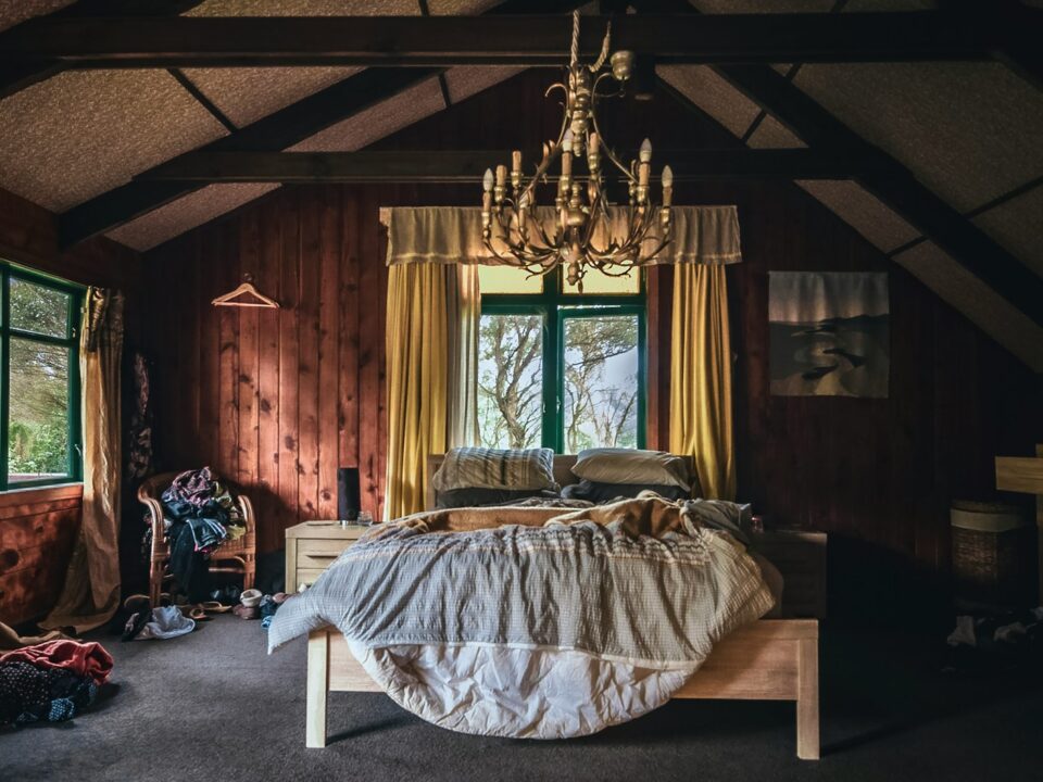white bed linen on bed