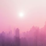 skyscraper covered with fog at daytime