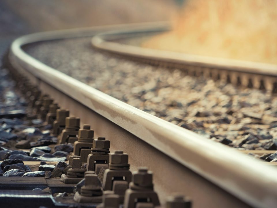 a close up of a train track with a blurry background
