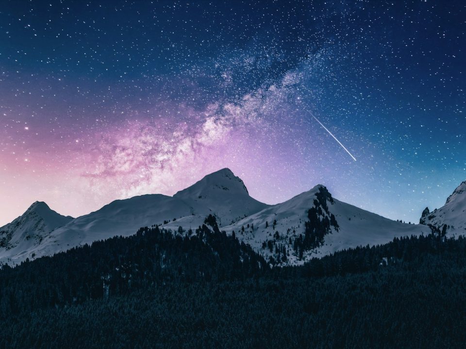 snow mountain under stars