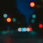 a blurry photo of a street with traffic lights