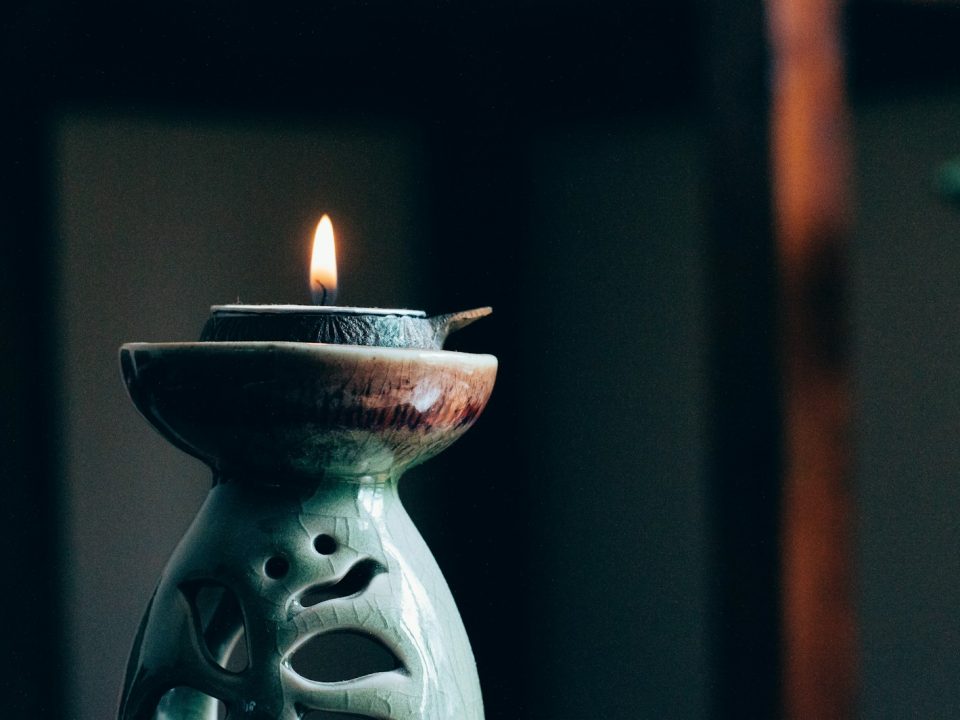 rule of thirds photography of lit candle
