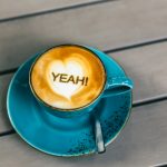 blue ceramic mug with coffee