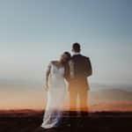 woman leaning her head to man's shoulder