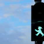 black traffic light with green light